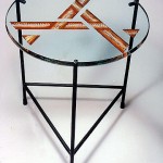 Carved and painted glass end table.