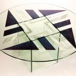 Glass top coffee table carved and painted.