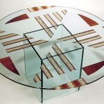 Glass top coffee table carved and painted.