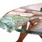 Carved and laminated glass table top.