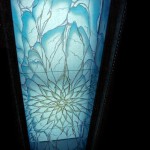 Carved and painted glass skylight.