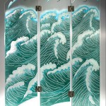 Carved, tempered, and painted glass screen.