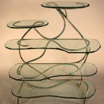 Carved and painted glass. Patina bronze shelves by Rhonda Kap