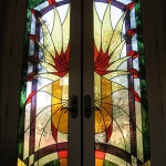 Stained glass front doors.